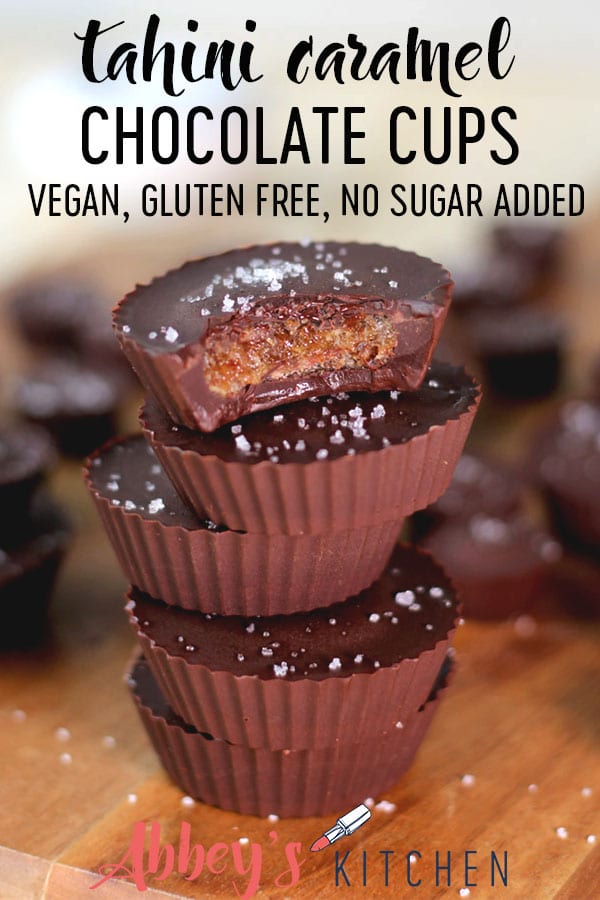 pinterest image of a stack of vegan no sugar added tahini chocolate caramel cups  with text overlay