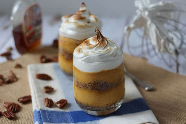 Two pumpkin parfait in clear glasses.