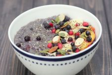 A white bowl of slow cooker blueberry quinoa.