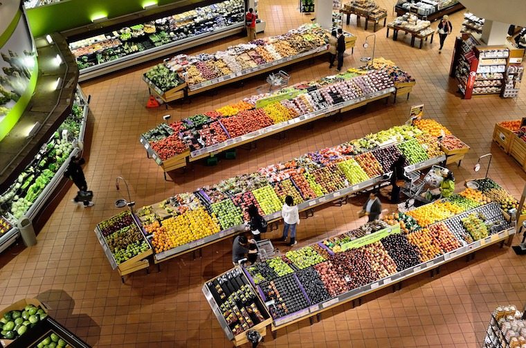 fruits and vegetables on display at the grocery store