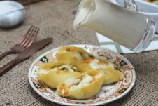 Vegan Stuffed Butternut Squash Shells with Sage Cashew Cream Sauce are the perfect plant-based Thanksgiving, Christmas or holiday main for entertaining a crowd!