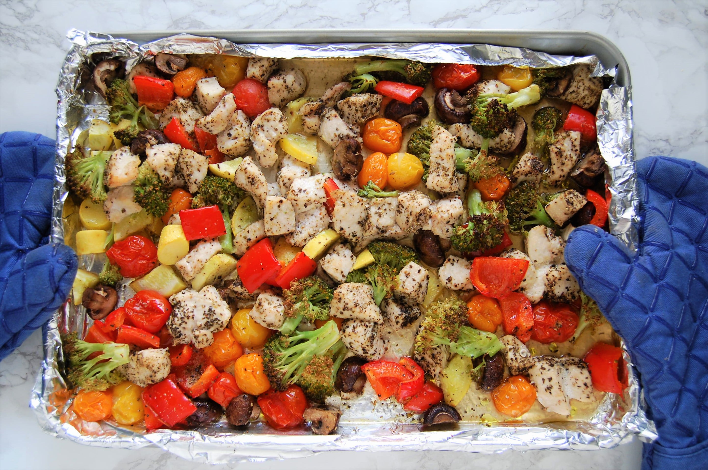 birds eye view of paleo sheet pan and chicken vegetables dinner