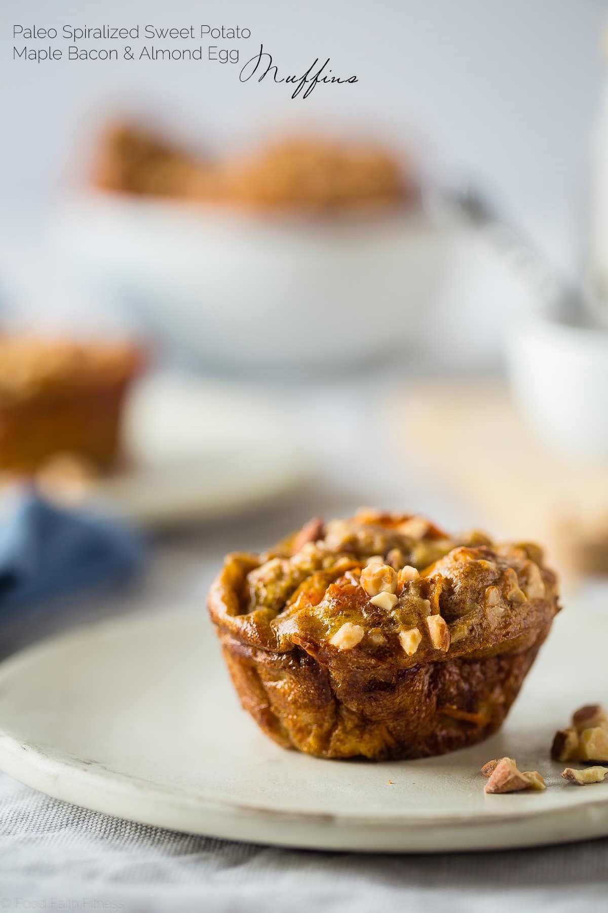 close up of paleo spiralized sweet potato and maple bacon almond egg cup on a white plate