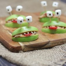 Close up of halloween apple alien smiles.