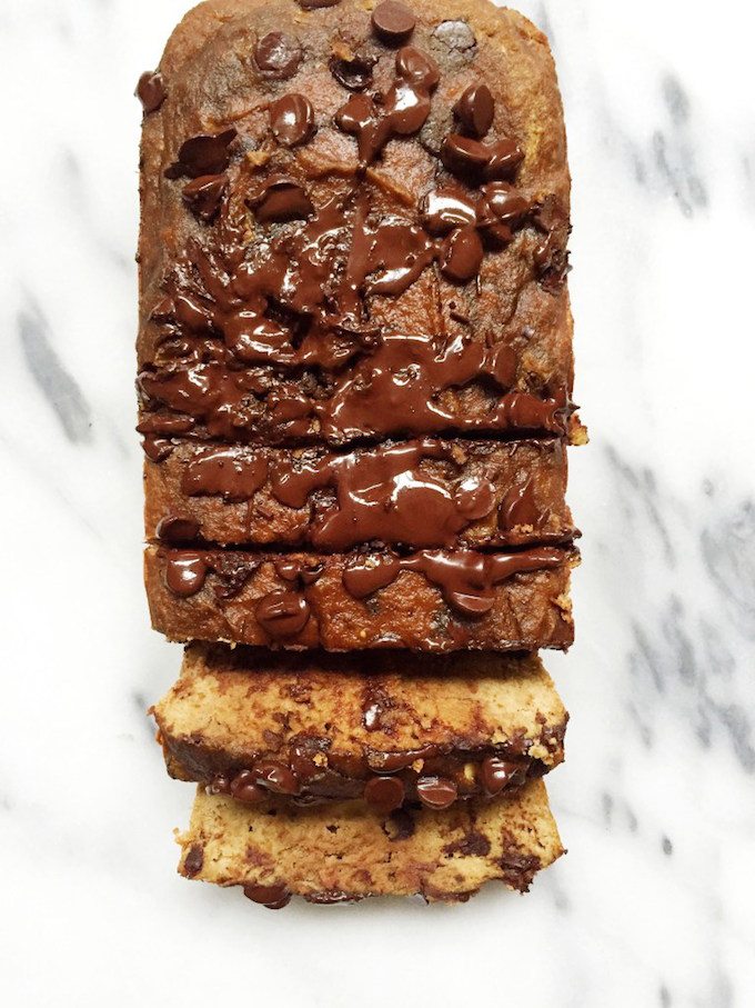 birds eye view of paleo chocolate chip banana bread on a marble counter