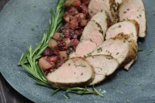 A high protein gluten free Paleo Rosemary Pork Tenderloin with Pear Cranberry Rosemary Sauce that's easy enough for a weeknight but elegant enough for hosting company!