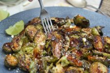 I'm spicing things up for Thanksgiving by serving up my tasty vegan and gluten free sweet chili roasted brussels sprouts side dish.