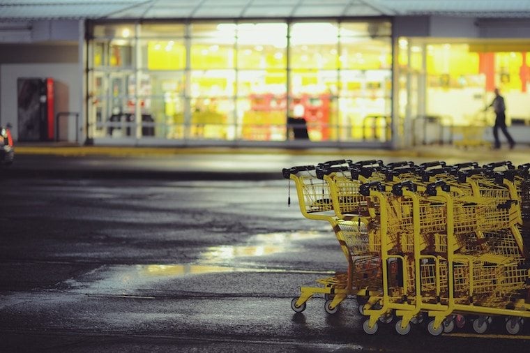 Shopping carts outside of a grocery store.