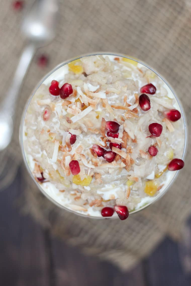 An overhead image of a glass with rice pudding in it.