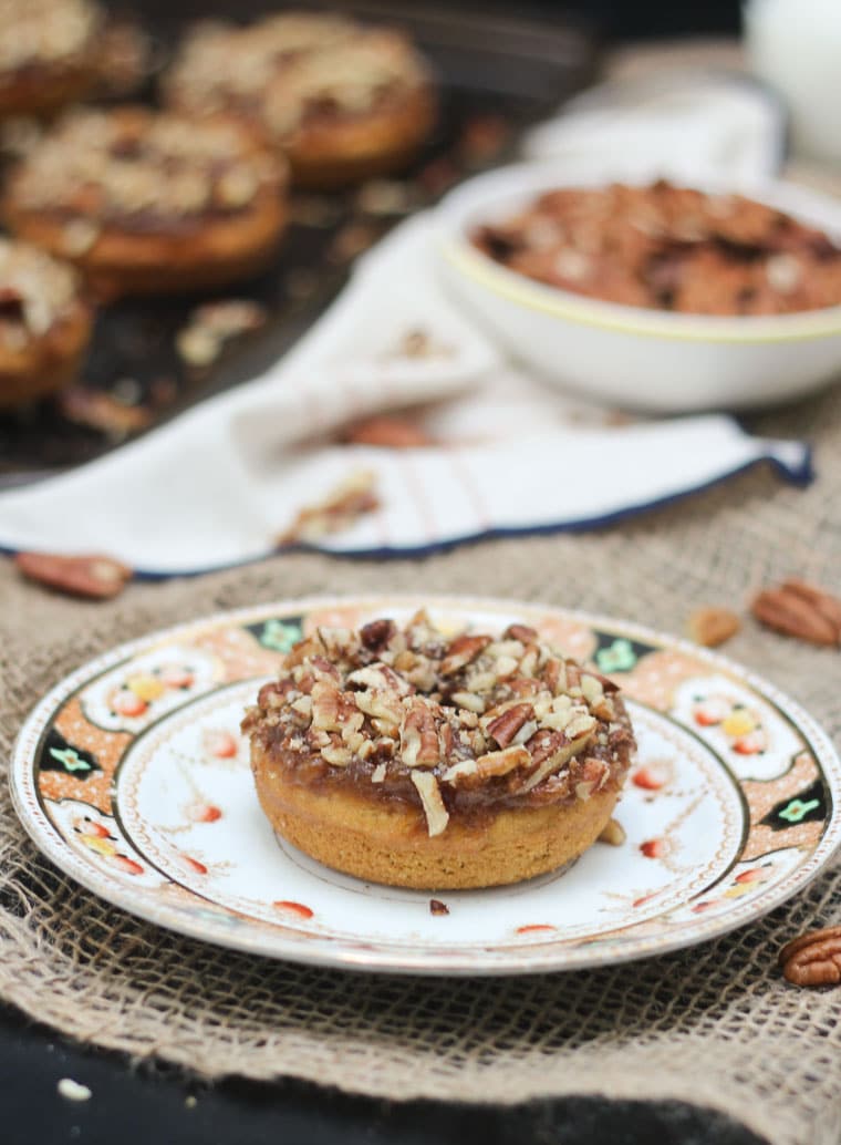 image of a homemade pumpkin pie donut on a white plate