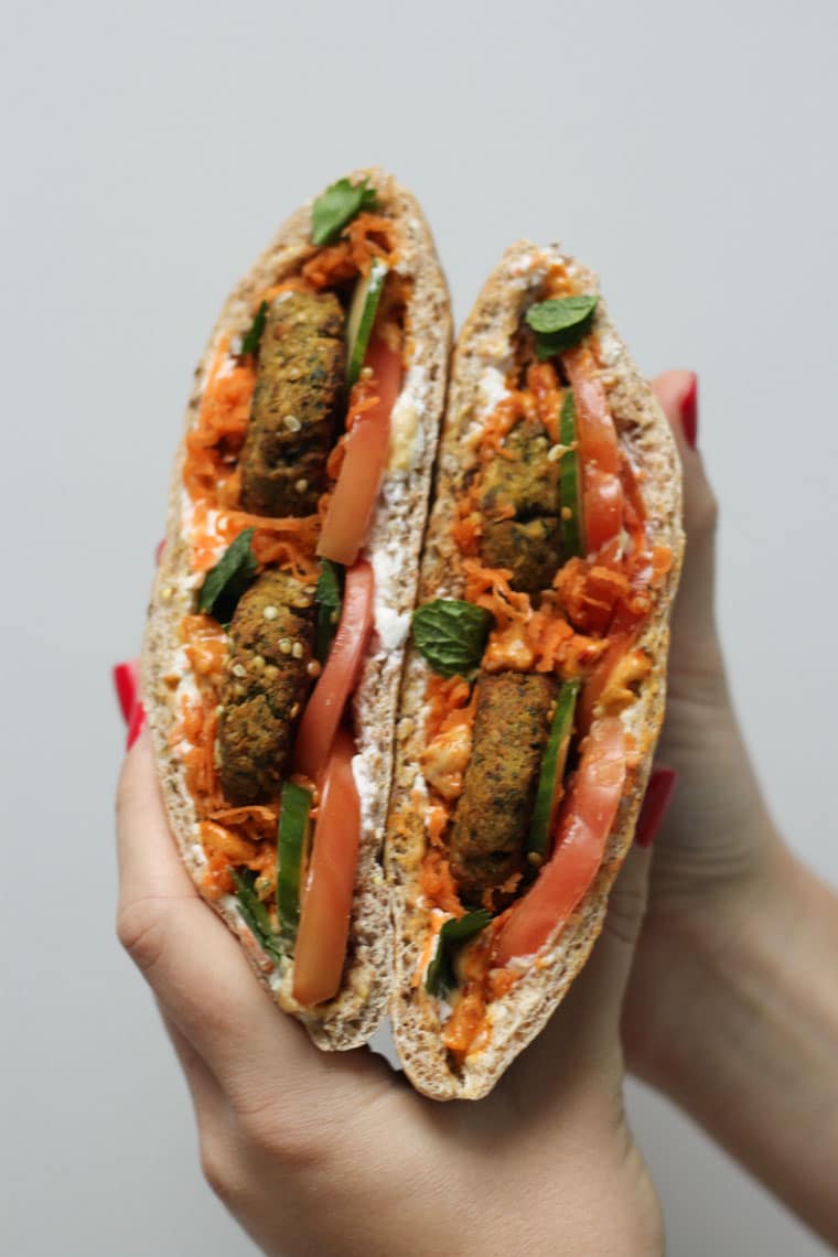 A pita sandwich with hemp heart falafels inside.