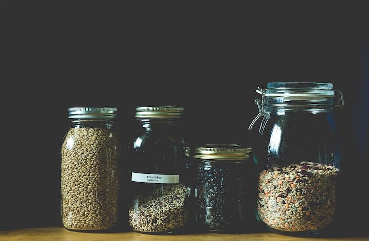 glass jars containing whole grains