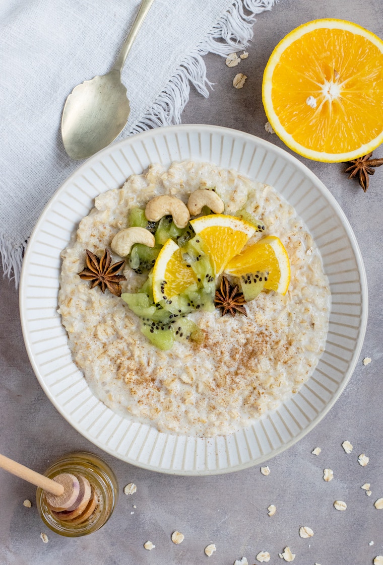 Overheat image of porridge with fruit on top.\" 