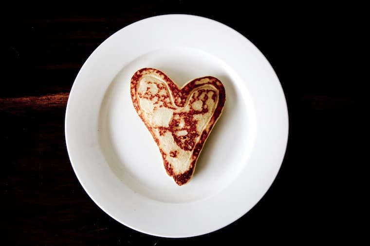 heart shaped pancake on a white plate
