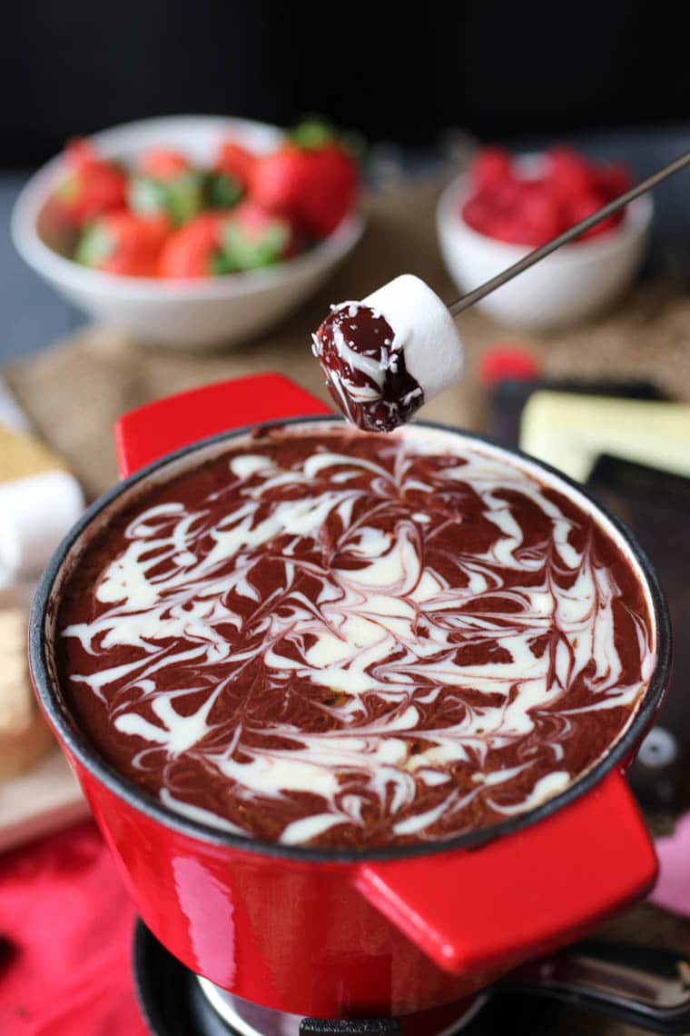 marshmallow dipped in red velvet fondue 