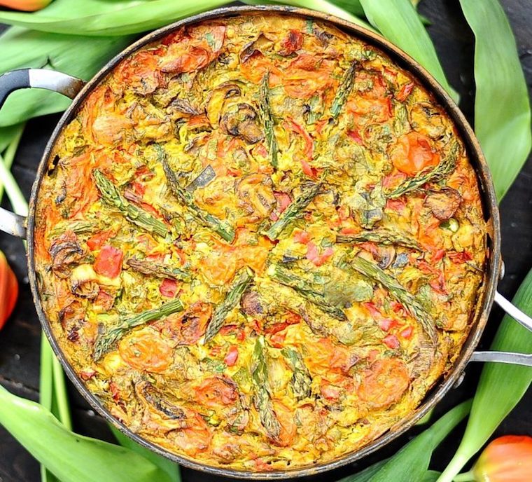 birds eye view of vegan and gluten free frittata for easter brunch served in a black skillet