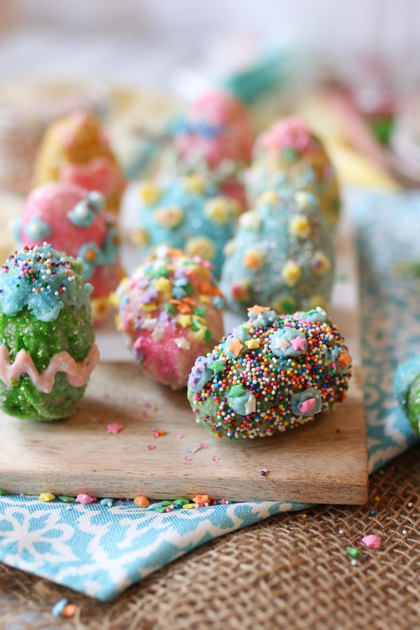 easter eggs made from rice krispies on a wooden plate 