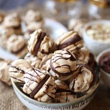 These Gluten Free Almond Cherry Chocolate Meringue Cookies with Dairy Free Chocolate Ganache are perfect for your Passover seder or any time of year!
