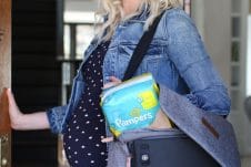 Abbey Sharp with her essential hospital go-bag with pampers.