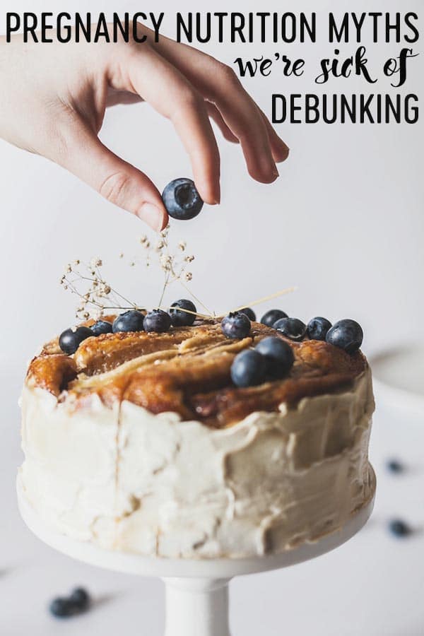 pinterest image of Hand topping a cake with a blueberry with text overlay 