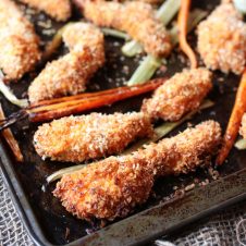 This Gluten Free Buffalo Chicken Fingers Sheet Pan Dinner with Roasted Carrots and Celery is a simple one pan wonder that also make great freezer meals for crazy nights.