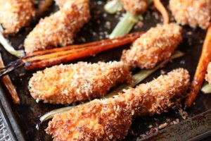 This Gluten Free Buffalo Chicken Fingers Sheet Pan Dinner with Roasted Carrots and Celery is a simple one pan wonder that also make great freezer meals for crazy nights.