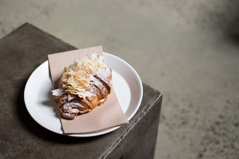 Almond croissant on a plate with a napkin. 