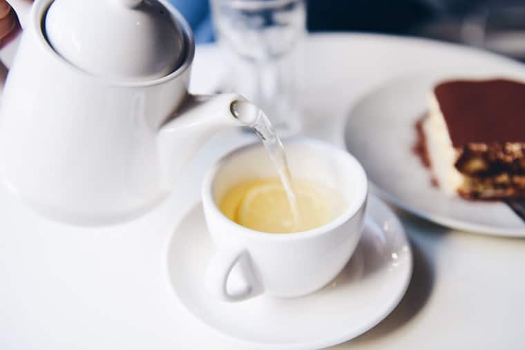 Tea poured into a cup. 