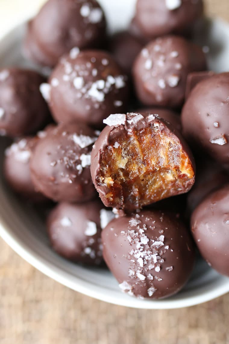 Close up of salted tahini date caramel truffles. 