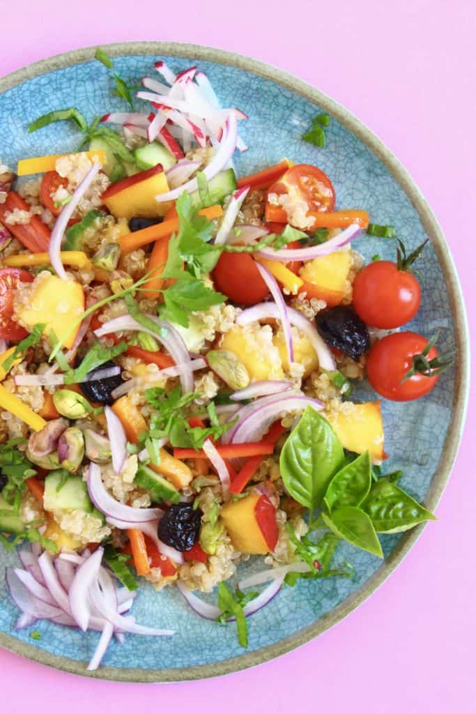 Nectarine quinoa tabbouleh on a plate. 