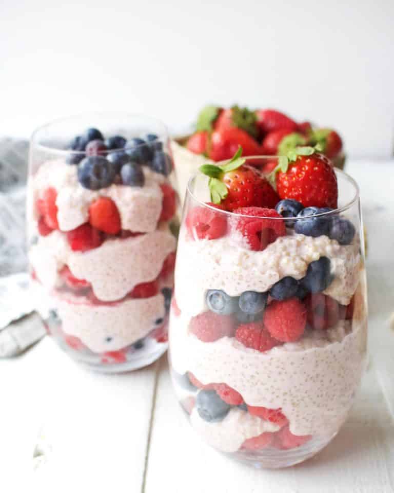 Berry quinoa parfait in two glasses. 