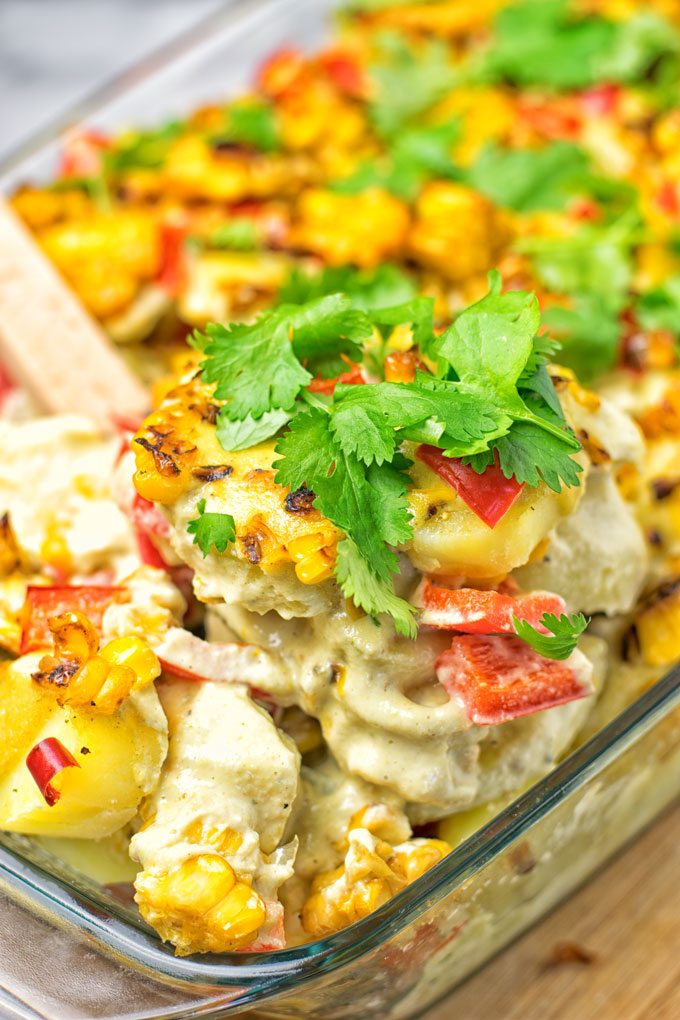 Corn potato casserole topped with parsley. 