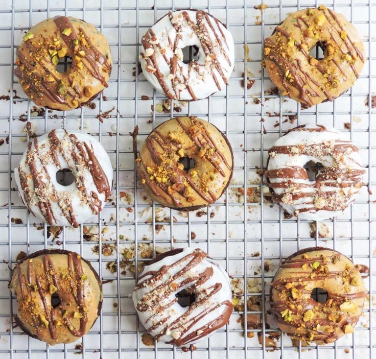 Overhead photo of nine fudgy chocolate cake donuts.