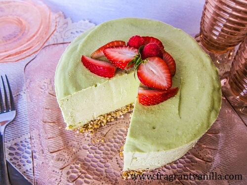 Key lime cheesecake on a platter. 