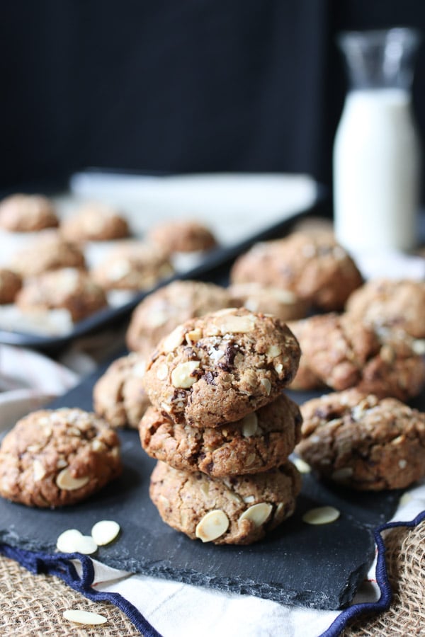 Three lactation cookies stacked on a serving dish.