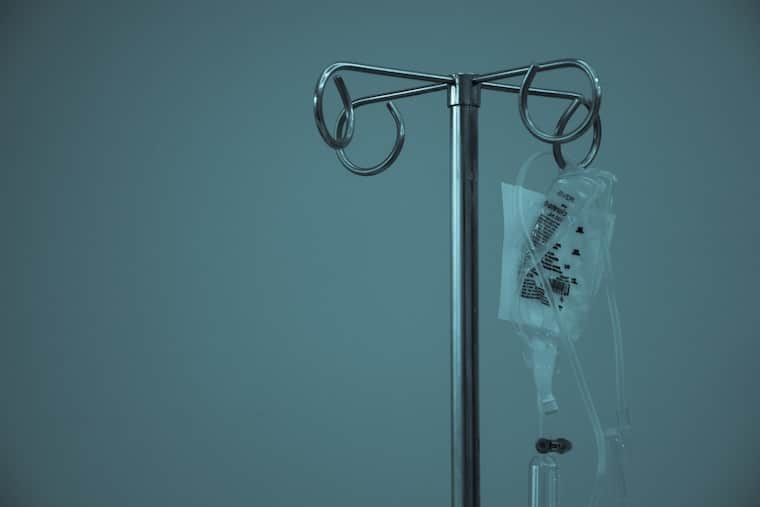 An IV bag, hanging.