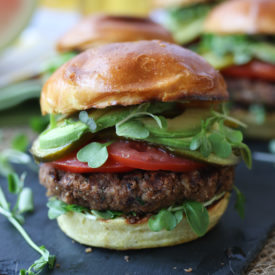 A close up photo of a burger.