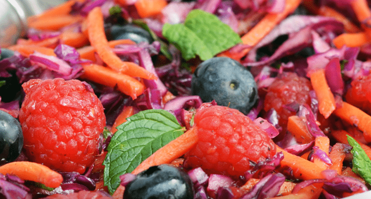 close up of gluten free berry salad slaw