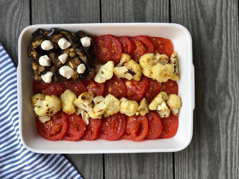 birds eye view of patriotic roasted vegetables flag in a white dish