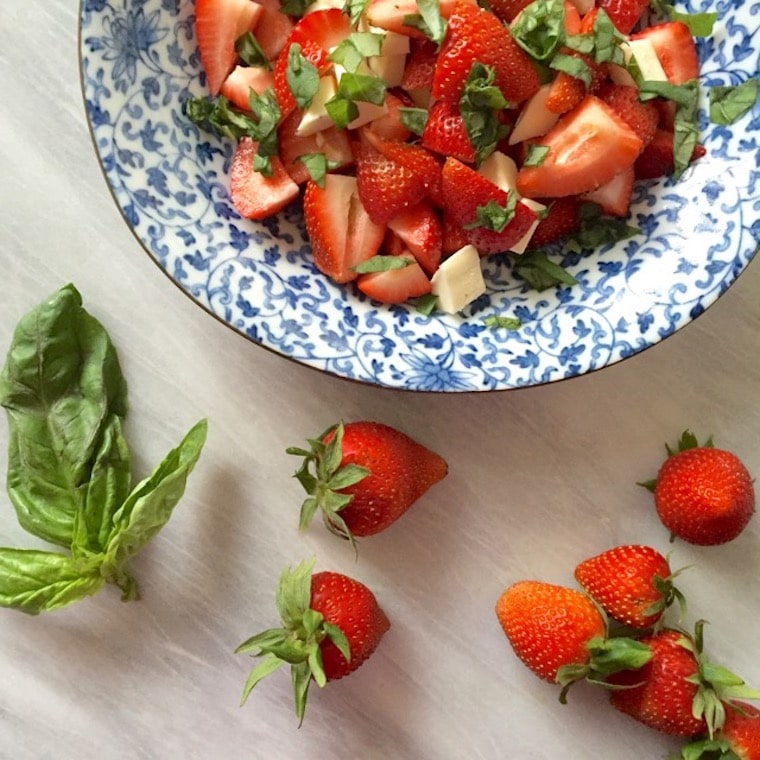 Strawberry salad in a bowl.