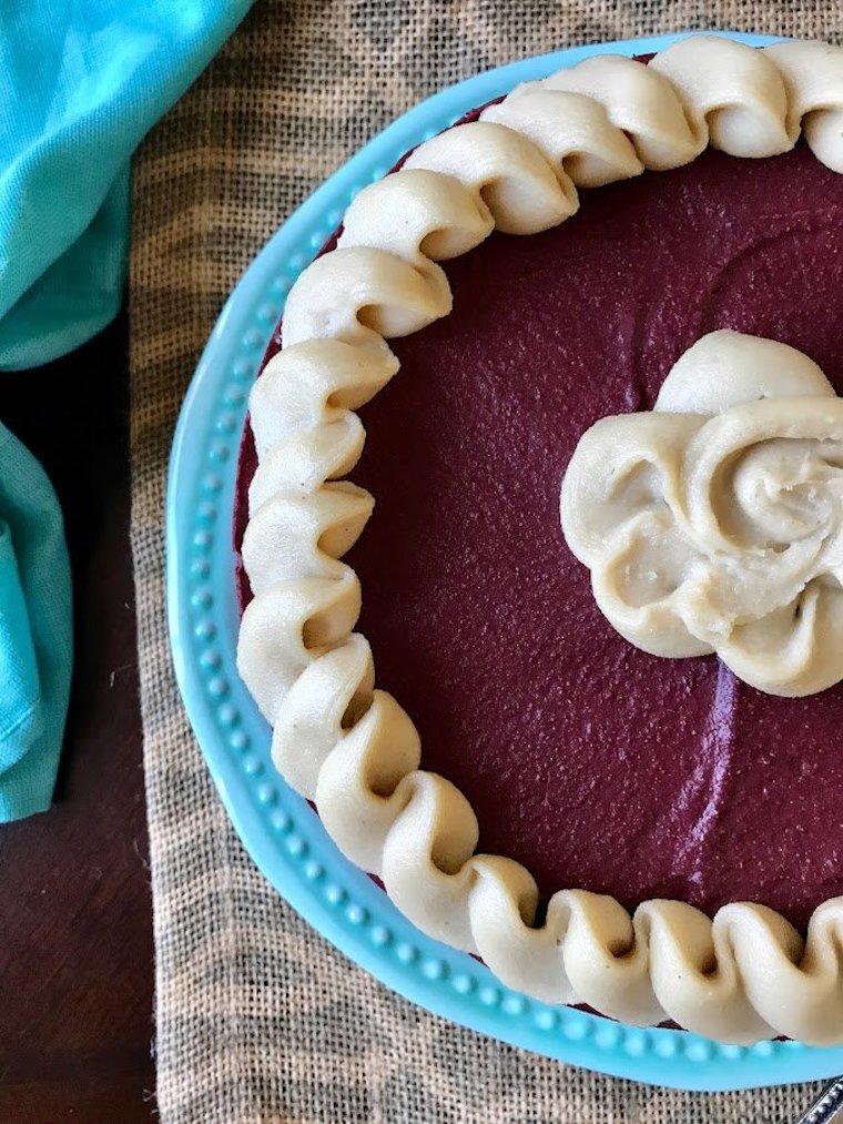 Cheesecake in a blue ceramic dish.