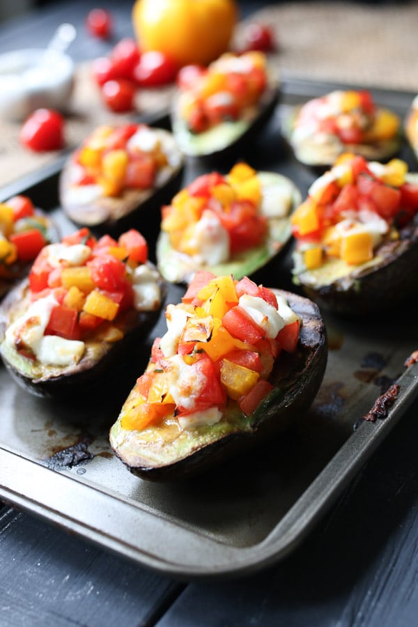 Grilled avocado bruschetta on a baking tray. 