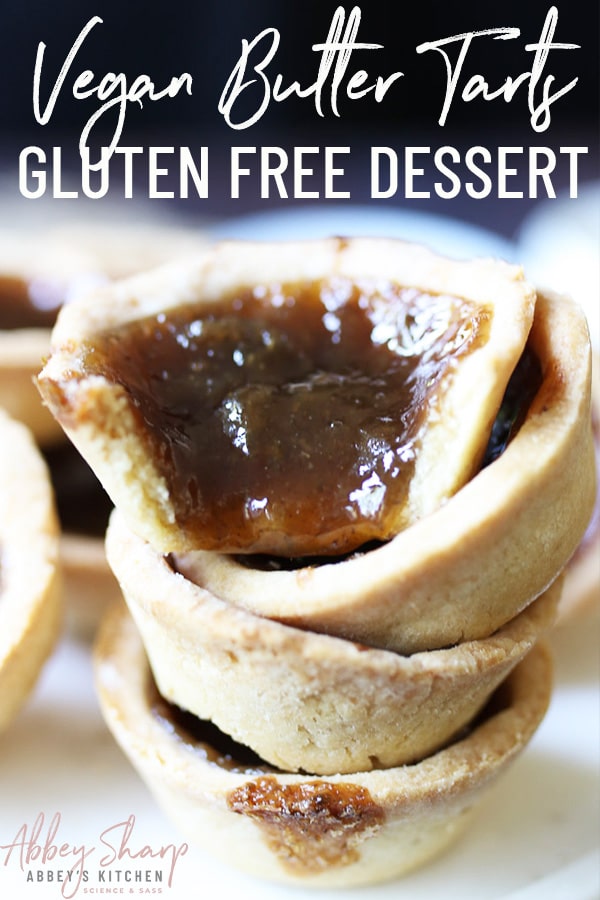 several butter tarts stacked onto of one another 