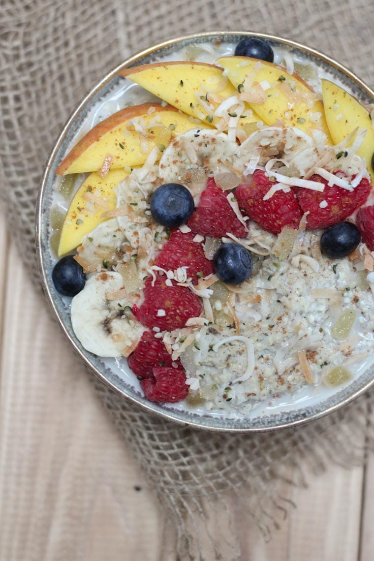 birds eye view of hemp hearts no oats porridge topped with fruit 