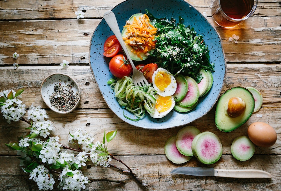 A salad on a wooden board.