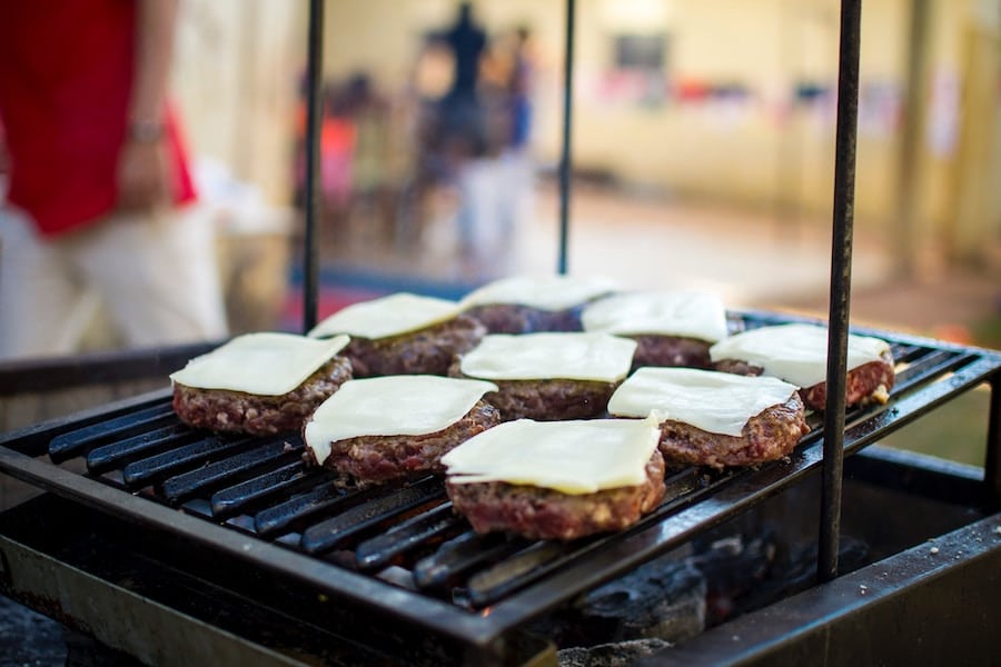 Burgers on a hot grill.