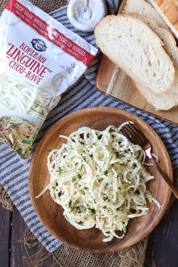 birds eye view of paleo low carb alfredo pasta recipe on a wooden plate