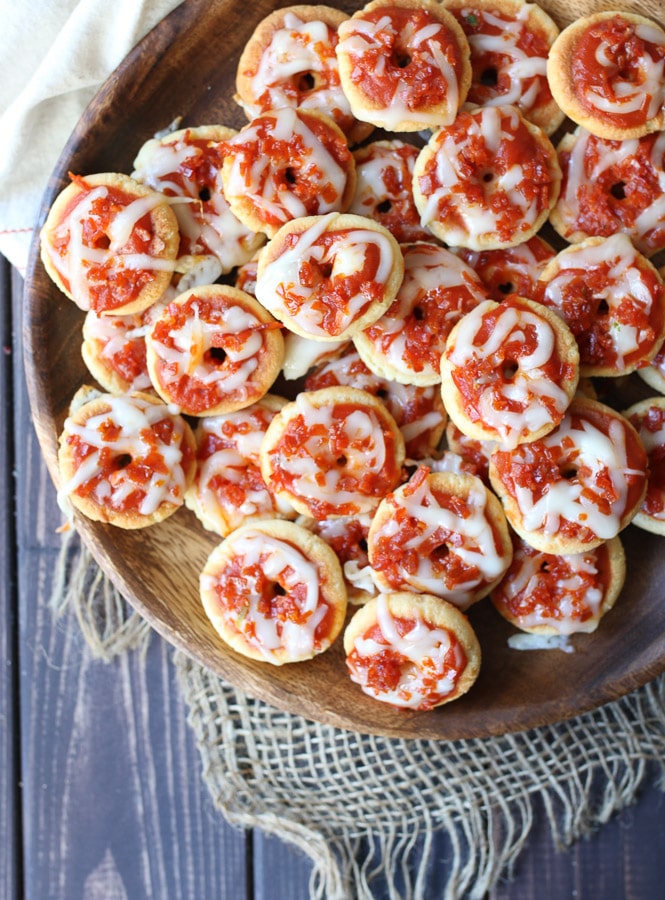 Keto bagel bites on a wooden plate.