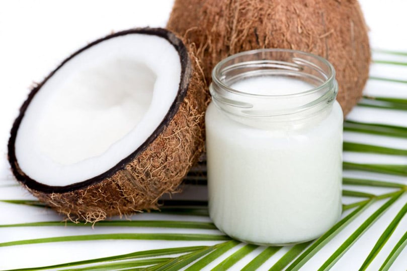 coconut oil next to a coconut