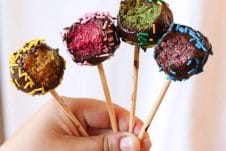 These Vegan Rainbow Cake Pops are delicious gluten free healthy treats for kids and adults alike that can be made in a rainbow of colours and decorated with little sprinkles and candies!